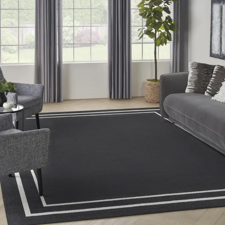 8' X 10' Black And Ivory Indoor Outdoor Area Rug