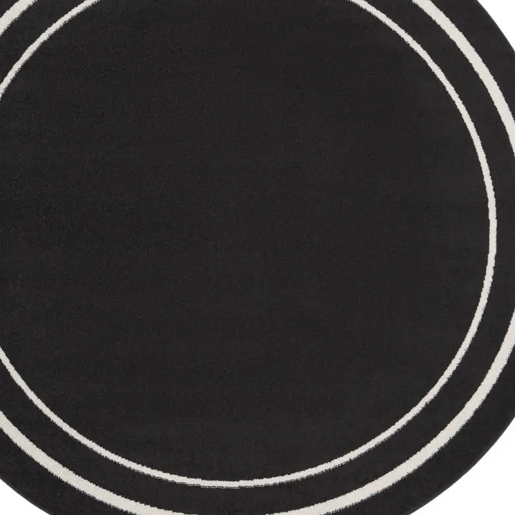 8' Black And Ivory Round Indoor Outdoor Area Rug