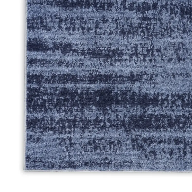 5' X 7' Denim Blue And Navy Blue Abstract Indoor Outdoor Area Rug