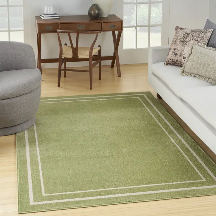 5' X 7' Green And Ivory Indoor Outdoor Area Rug