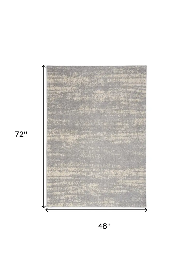 4' X 6' Gray And Beige Abstract Indoor Outdoor Area Rug