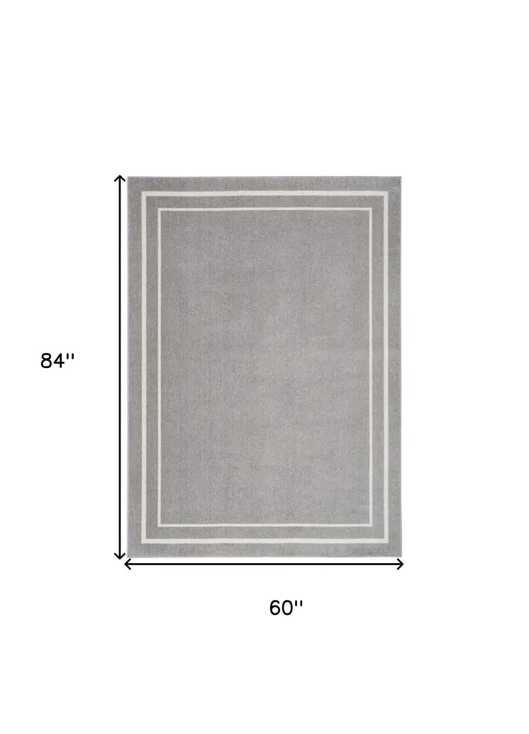 5' X 7' Gray And Ivory Indoor Outdoor Area Rug
