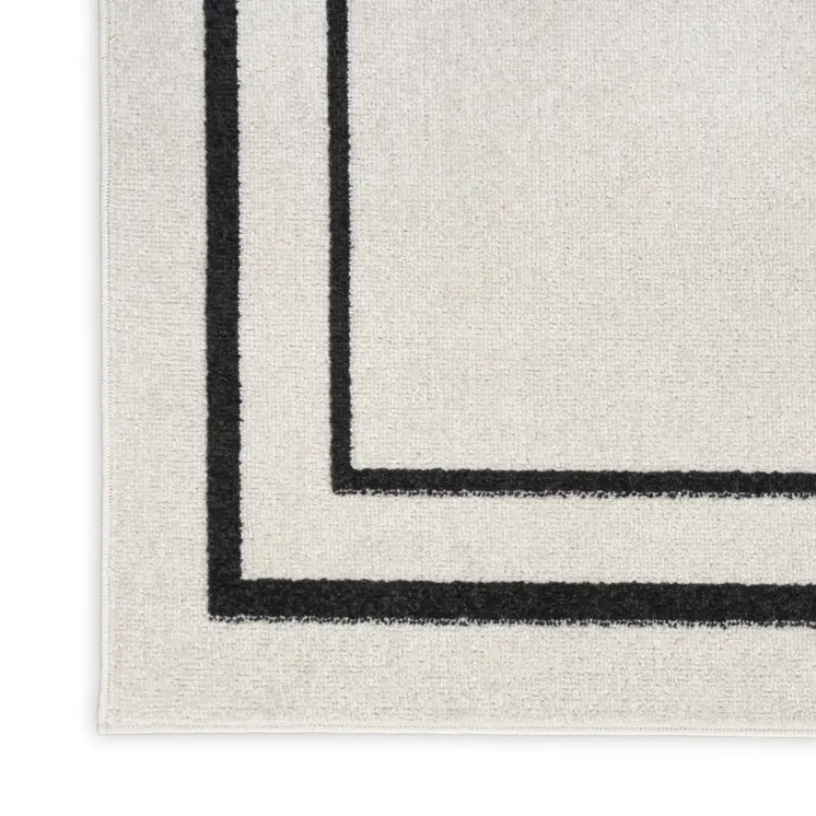 8' Ivory And Black Indoor Outdoor Runner Rug
