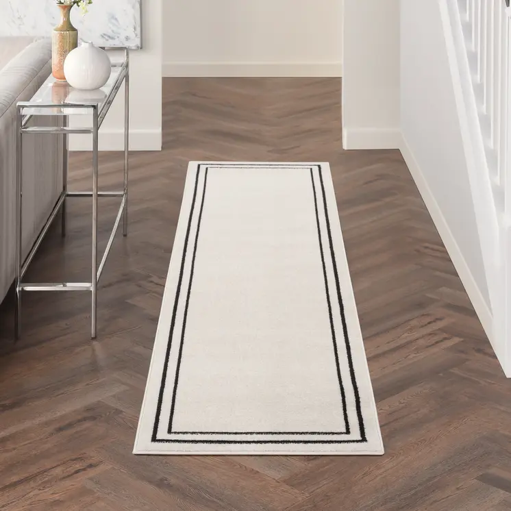 8' Ivory And Black Indoor Outdoor Runner Rug