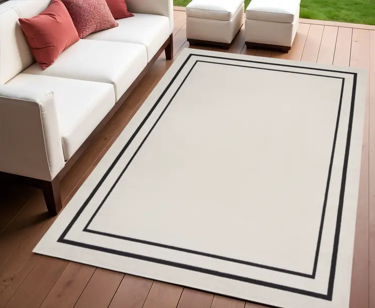 4' X 6' Ivory And Black Indoor Outdoor Area Rug
