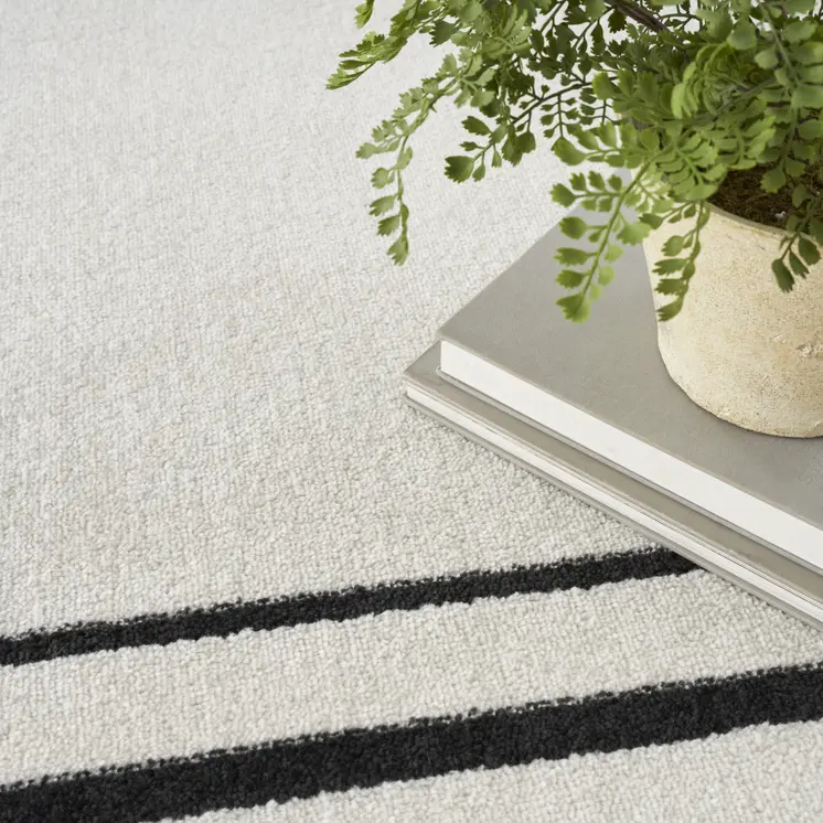6' X 9' Ivory And Black Indoor Outdoor Area Rug