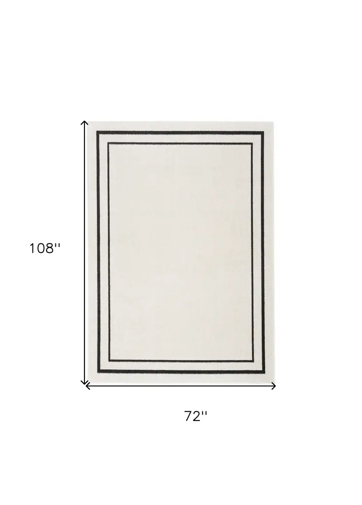 6' X 9' Ivory And Black Indoor Outdoor Area Rug