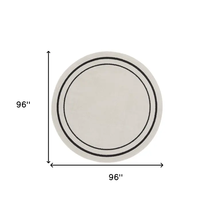8' Ivory And Black Round Indoor Outdoor Area Rug