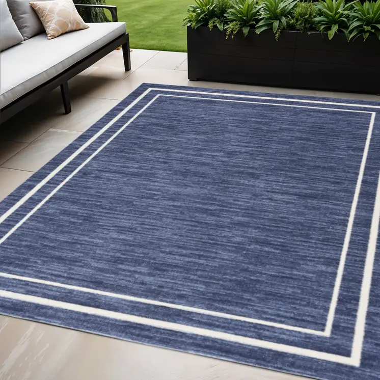 5' X 7' Navy Blue And Ivory Indoor Outdoor Area Rug