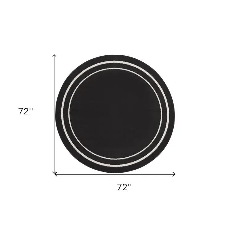 6' Black And Ivory Round Indoor Outdoor Area Rug
