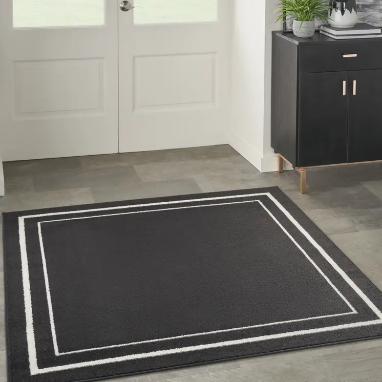 5' Black And Ivory Square Indoor Outdoor Area Rug