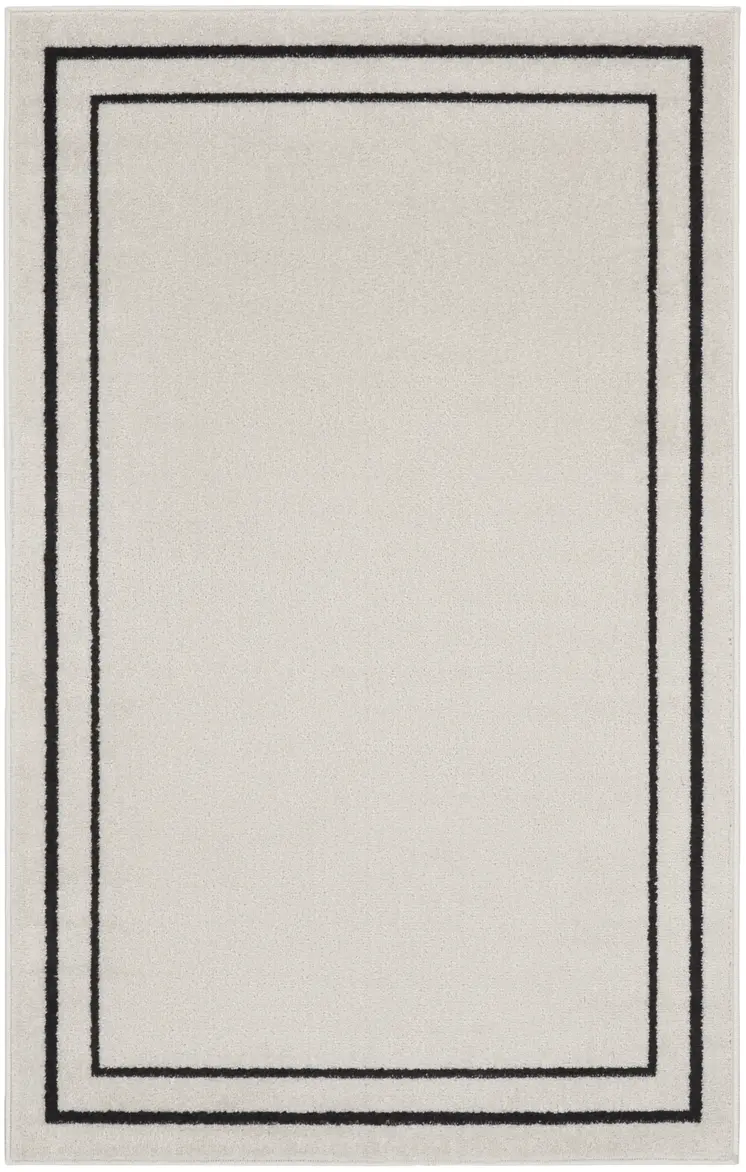 3' X 5' Ivory And Black Indoor Outdoor Area Rug