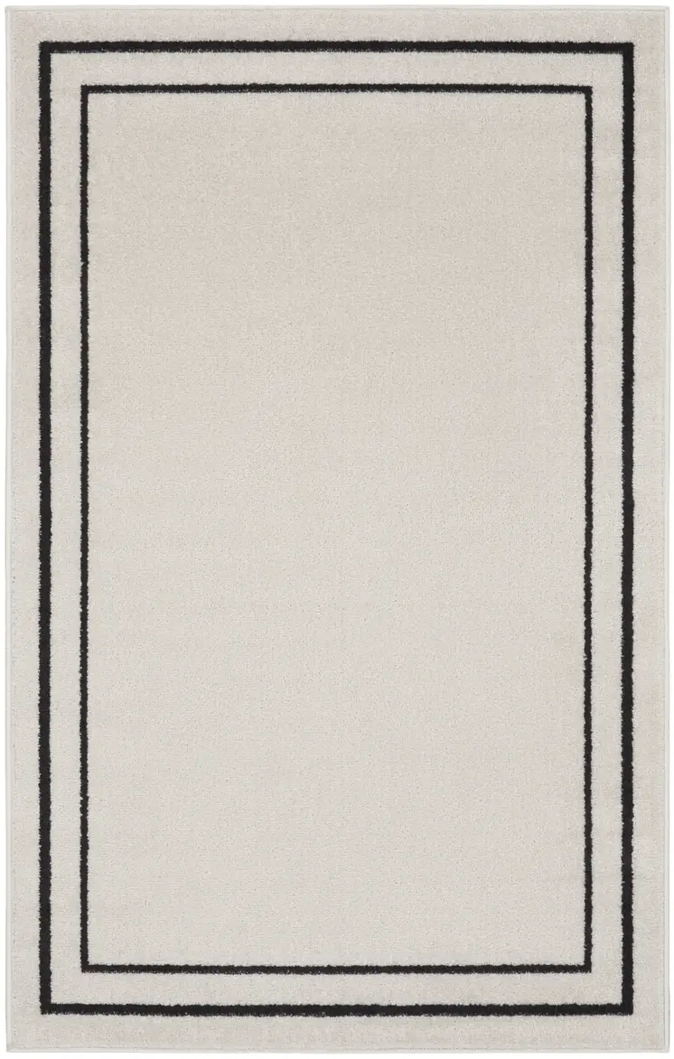 3' X 5' Ivory And Black Indoor Outdoor Area Rug