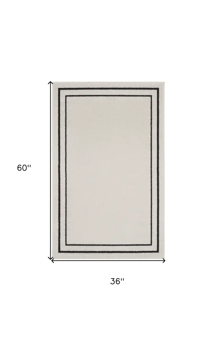 3' X 5' Ivory And Black Indoor Outdoor Area Rug