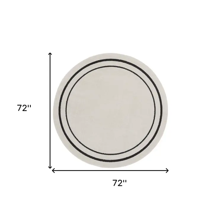 6' Ivory And Black Round Indoor Outdoor Area Rug