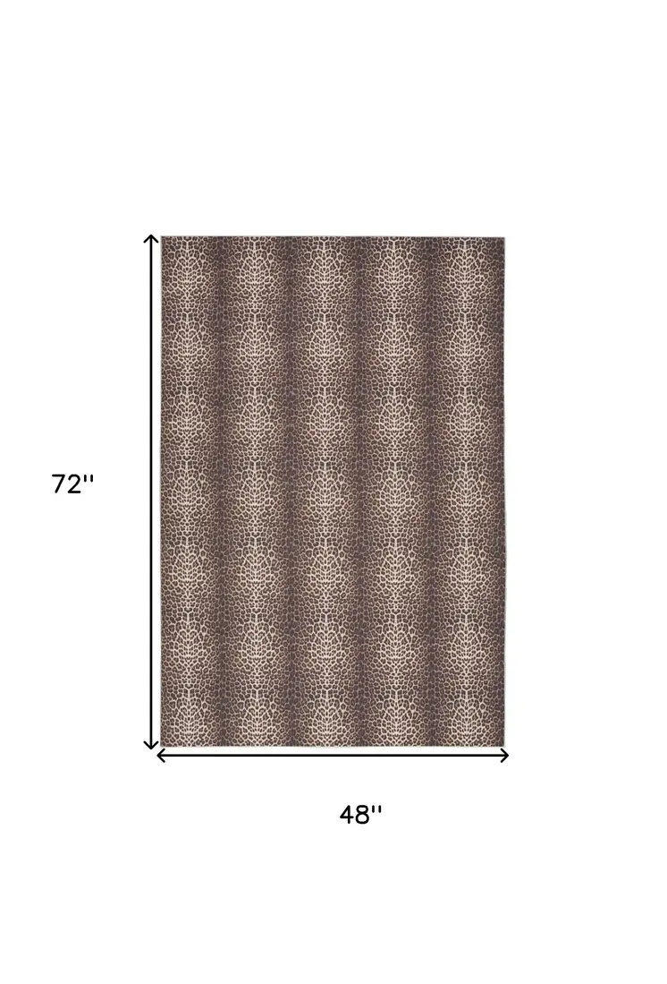 4' X 6' Yellow and Brown Leopard Print Power Loom Washable Non Skid Area Rug