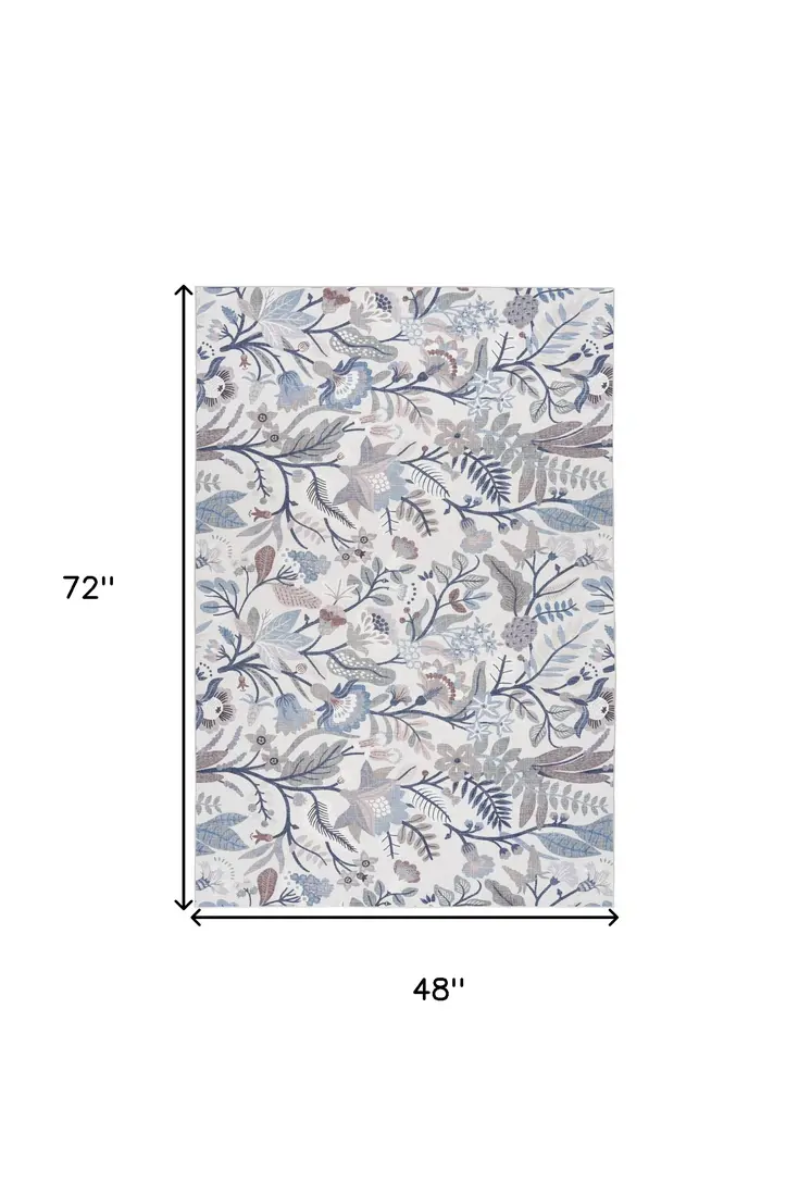 4' X 6' Ivory and Blue Floral Power Loom Washable Non Skid Area Rug