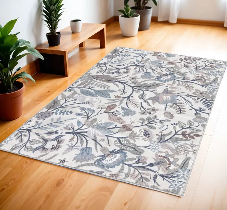 4' X 6' Ivory and Blue Floral Power Loom Washable Non Skid Area Rug
