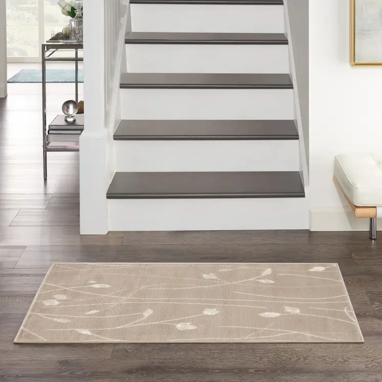 2' X 4' Beige and Ivory Floral Power Loom Area Rug