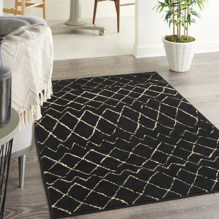 3' X 5' Beige and Black Abstract Power Loom Area Rug