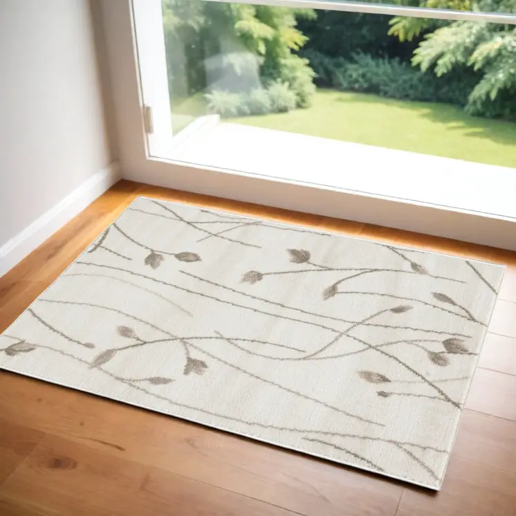 2' X 4' Beige and Ivory Floral Power Loom Area Rug