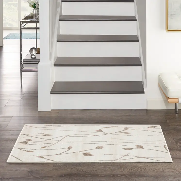 2' X 4' Beige and Ivory Floral Power Loom Area Rug