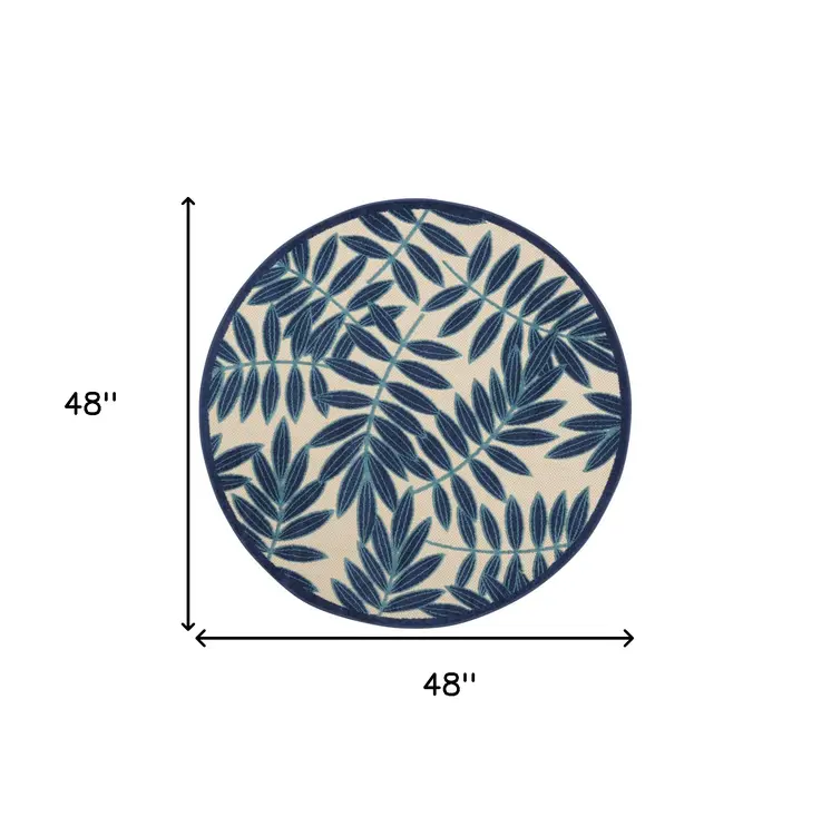 4' Navy Blue And Ivory Round Botanical Leaves Indoor Outdoor Area Rug