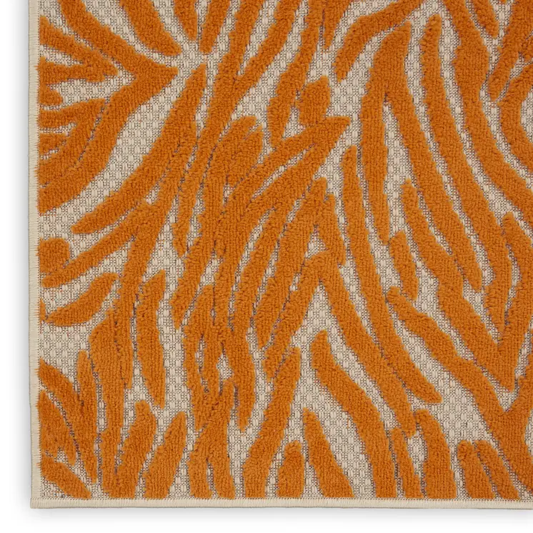 3' X 4' Orange And Ivory Animal Print Indoor Outdoor Area Rug