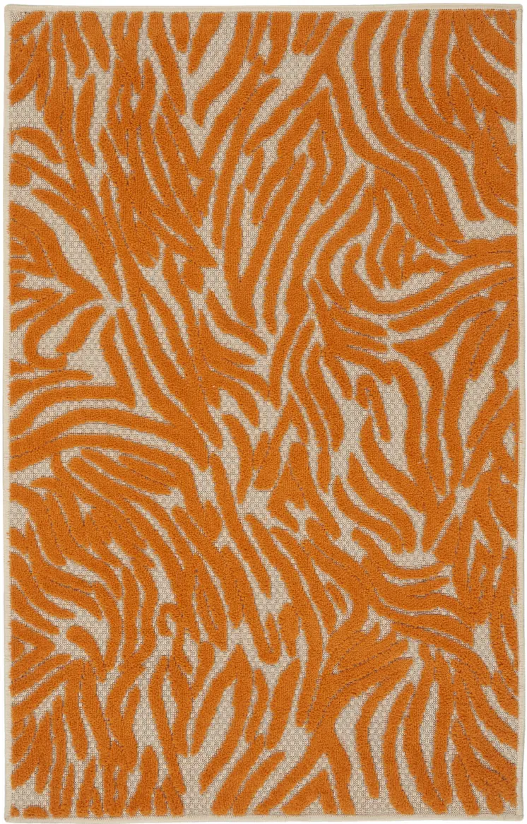 3' X 4' Orange And Ivory Animal Print Indoor Outdoor Area Rug