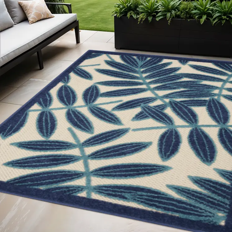 5' X 8' Navy Blue And Ivory Palm Leaf Indoor Outdoor Area Rug