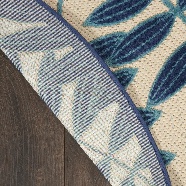 8' Navy Blue And Ivory Round Botanical Leaves Indoor Outdoor Area Rug