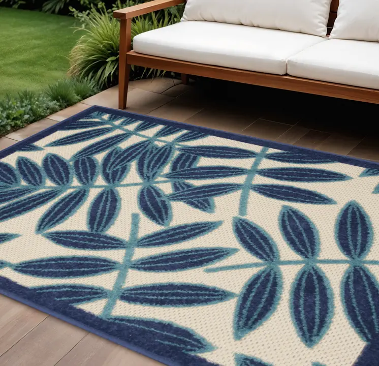7' X 10' Navy Blue And Beige Botanical Leaves Indoor Outdoor Area Rug