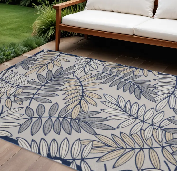 8' X 11' Navy Blue And Ivory Botanical Leaves Indoor Outdoor Area Rug