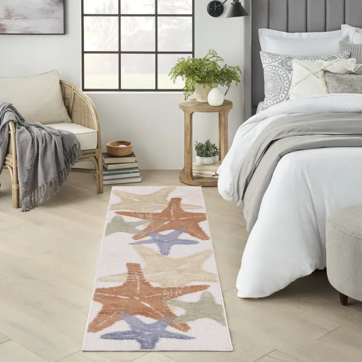 8' Ivory Yellow Orange And Green Starfish Indoor Outdoor Runner Rug
