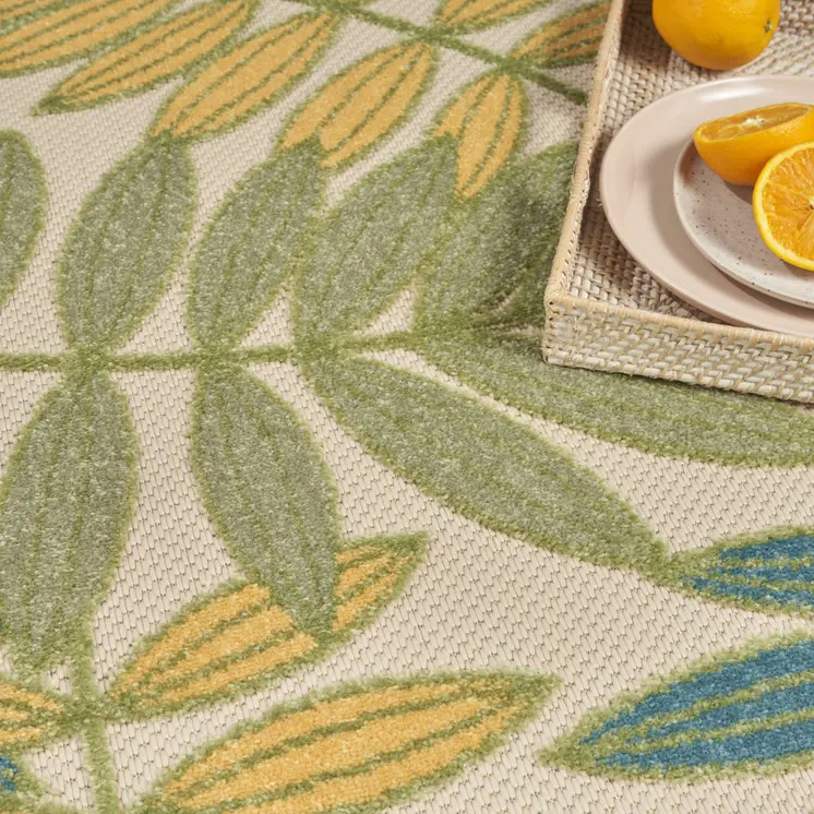 5' Green Yellow And Ivory Round Palm Leaf Indoor Outdoor Area Rug