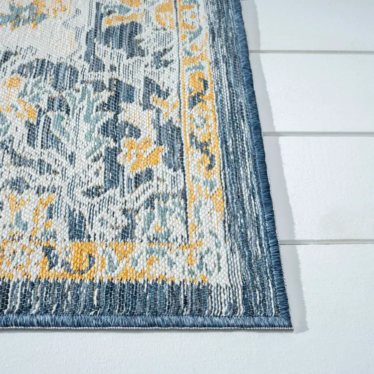 5' X 7' Blue and Ivory Medallion Stain Resistant Indoor Outdoor Area Rug