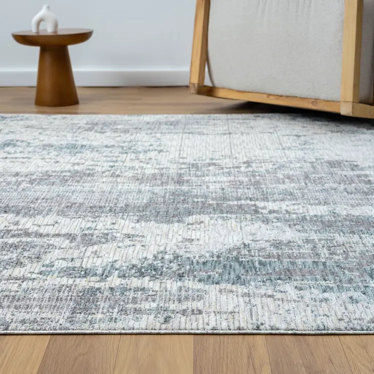 5' X 8' Gray and Ivory Abstract Area Rug
