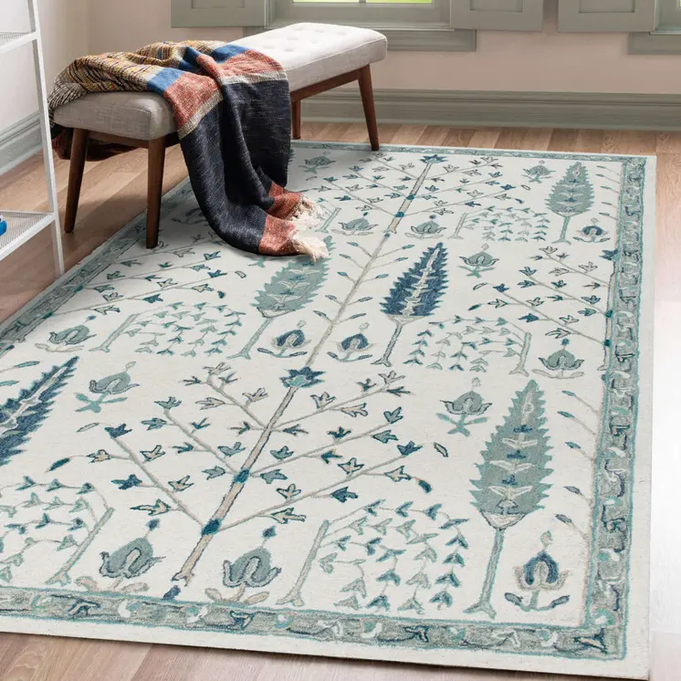 8' X 10' Ivory and Blue Wool Floral Hand Tufted Area Rug