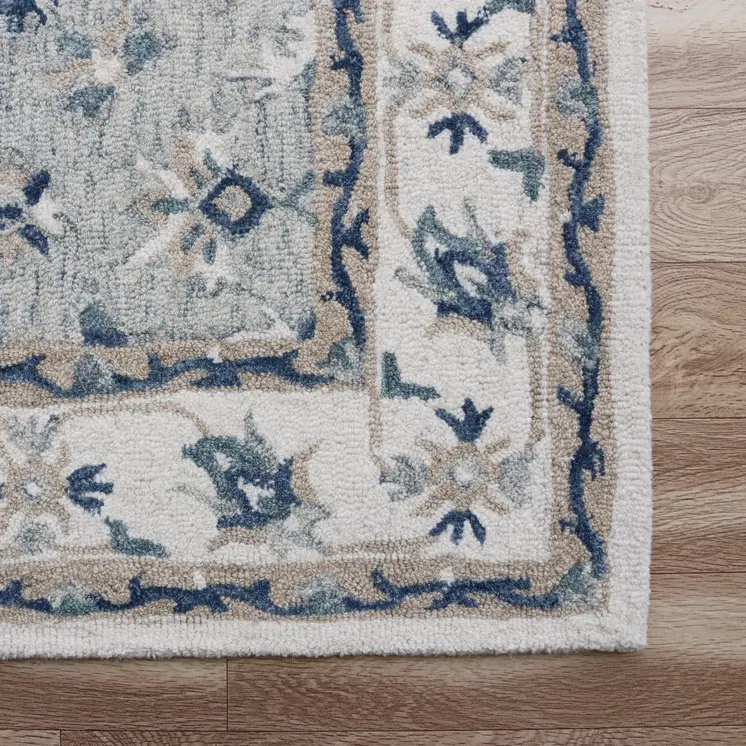 8' X 10' Blue and Ivory Wool Floral Hand Tufted Area Rug