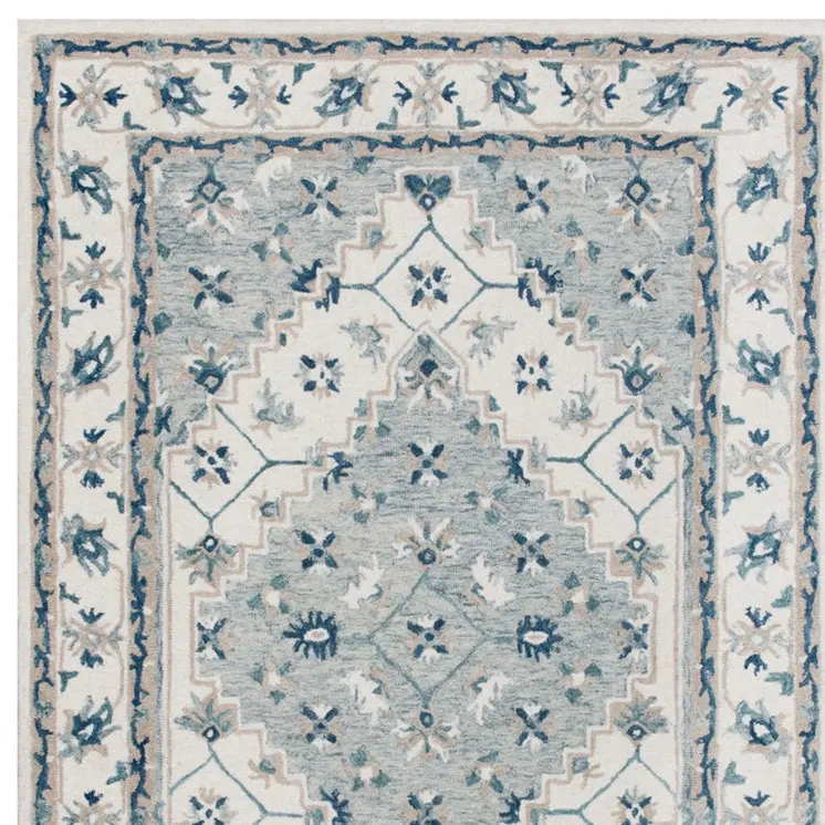 8' X 10' Blue and Ivory Wool Floral Hand Tufted Area Rug
