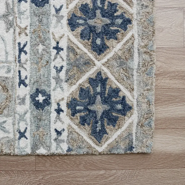 5' X 8' Blue and Ivory Wool Floral Hand Tufted Area Rug