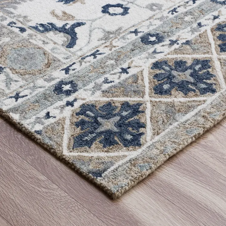 5' X 8' Blue and Ivory Wool Floral Hand Tufted Area Rug