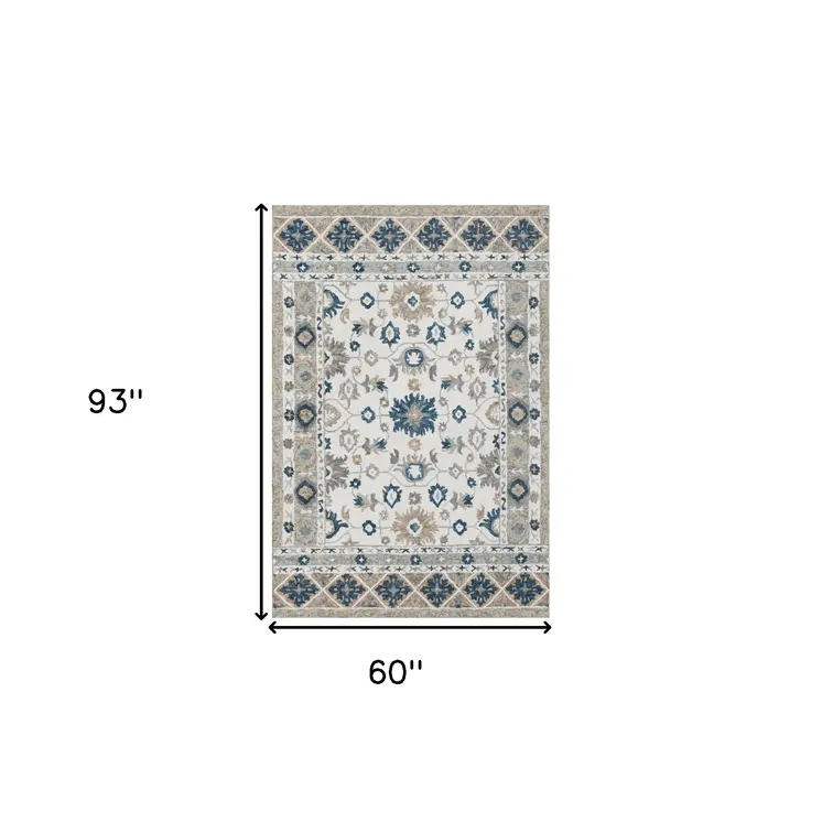 5' X 8' Blue and Ivory Wool Floral Hand Tufted Area Rug