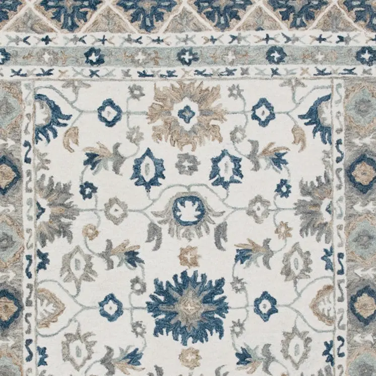 5' X 8' Blue and Ivory Wool Floral Hand Tufted Area Rug