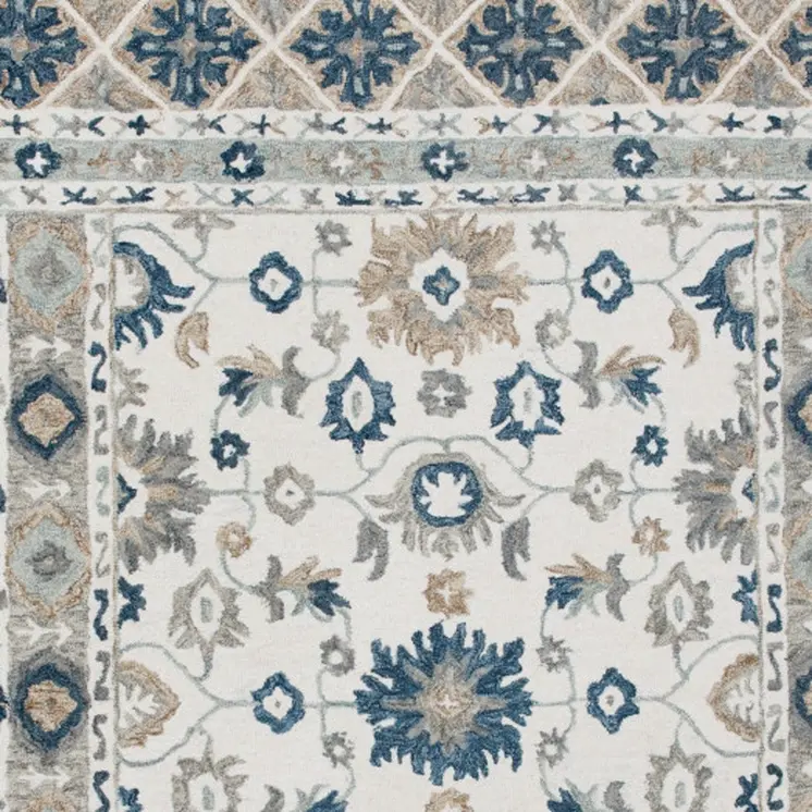 9' X 12' Blue and Ivory Wool Floral Hand Tufted Area Rug
