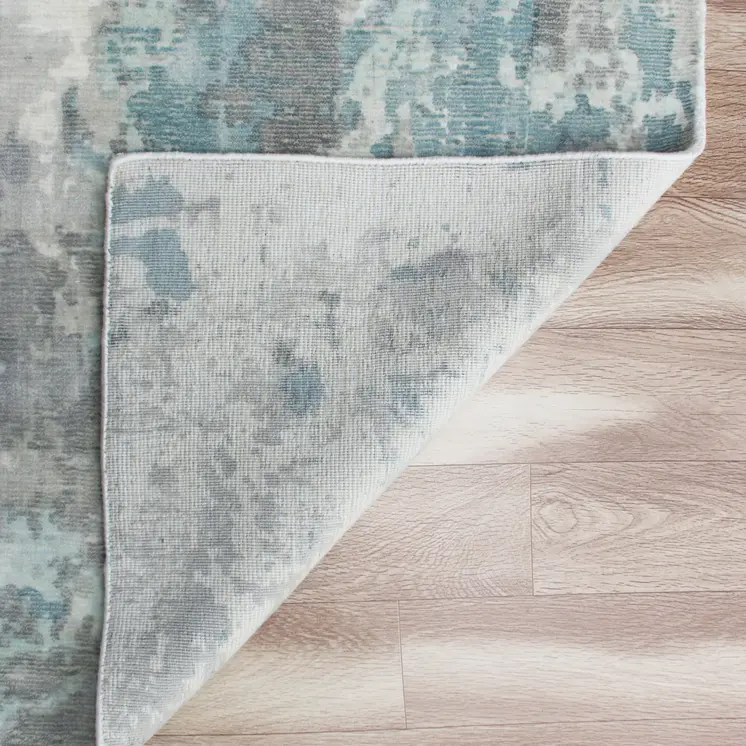 9' X 12' Ivory Blue and Gray Abstract Wool Blend Hand Loomed Area Rug