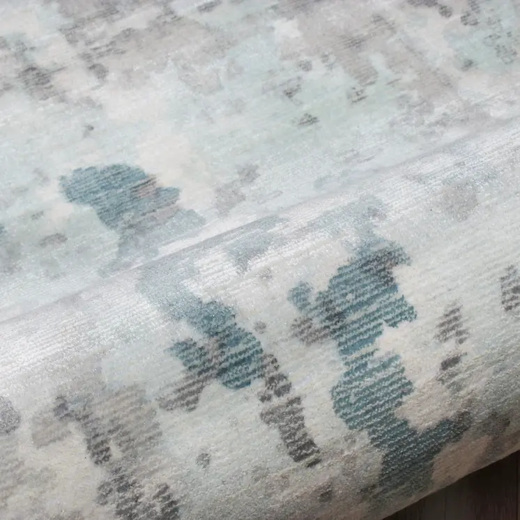 9' X 12' Ivory Blue and Gray Abstract Wool Blend Hand Loomed Area Rug