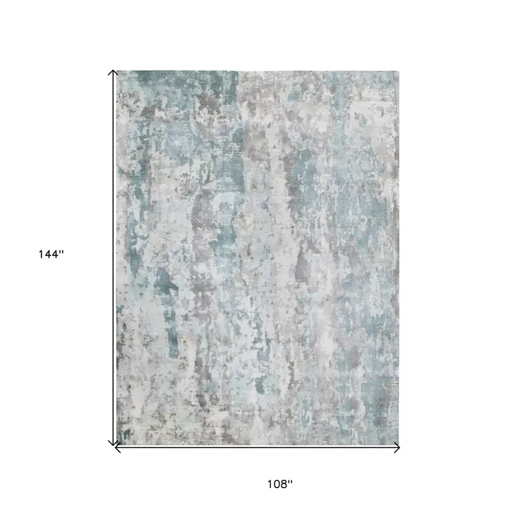 9' X 12' Ivory Blue and Gray Abstract Wool Blend Hand Loomed Area Rug