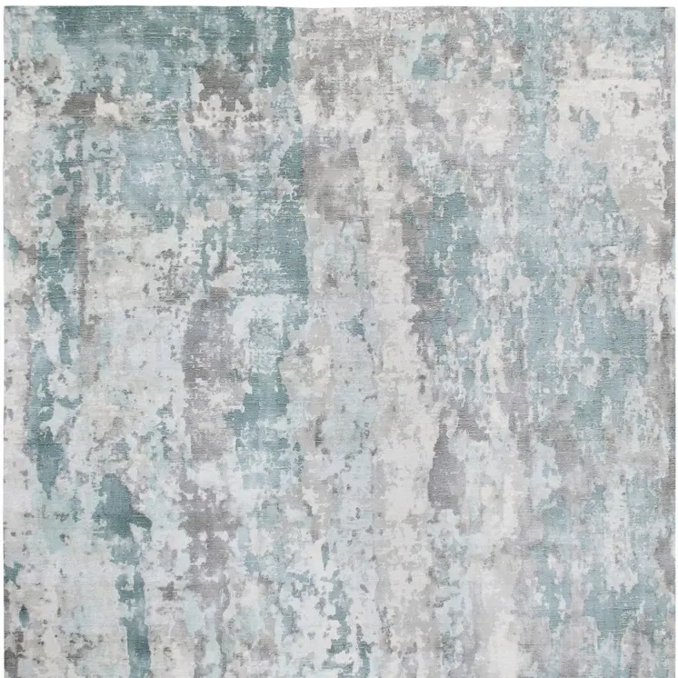 9' X 12' Ivory Blue and Gray Abstract Wool Blend Hand Loomed Area Rug