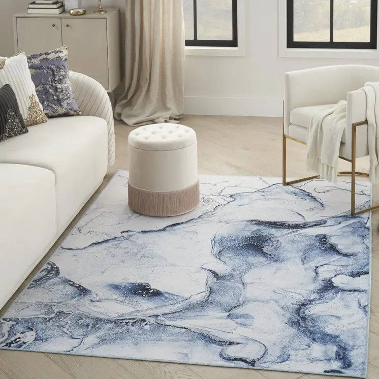 5' X 7' Ivory and Blue Abstract Power Loom Area Rug